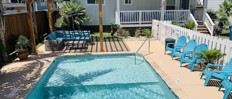 Pool area has full sun and shade to sit under and relax. 