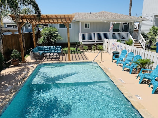 Pool area has full sun and shade to sit under and relax. 