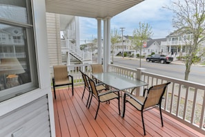 Table for outdoor eating or morning coffee. Extra wide quiet tree lined street.