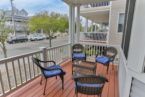 Large porch w/ awning for shade & privacy. Cushioned wicker conversation set.