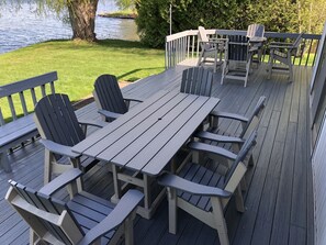 Awning covered outdoor seating area on the deck