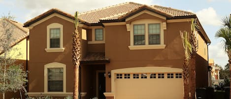 This luxury tile roof, brick paving villa