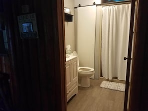 Bathroom with shower (no bathtub)