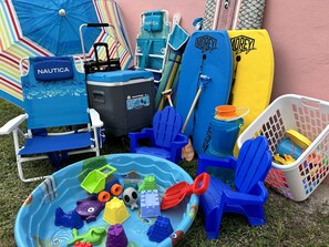 Beach cart, umbrellas, beach chairs, cooler, body boards, sand toys galore!