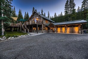 Front of house w/ garages.  (Plenty of parking!)