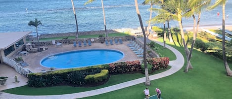 This is actual view from our Lani. White sand beach starts behind the pool.