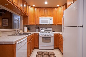 The kitchen is thoughtfully stocked with all the essentials, ensuring you have everything you need to cook and dine in comfort