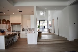 Huge open floor plan Great/living room, dining & kitchen lead to multiple patios