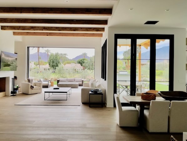 Doors seamlessly open up to multiple patios-Stunning indoor/outdoor living.