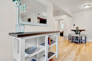 Entry way with large mirror