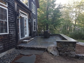 Flagstone patio facing the lake.  Great spot for morning coffee or evening wine!
