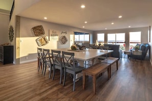 Open concept dining and living rooms with incredible ocean views