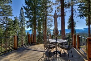 Relax on the sunny upstairs deck, an ideal spot to bask in the sunlight and take in the views