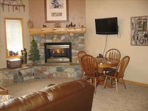Relax in front of the fire or in the private hot tub right outside your door