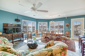 Open concept living area with harbor view