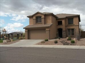 View of the front of the home- located next to small neighborhood park