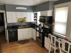 Updated kitchen with dishwasher, garbage disposal, Keurig