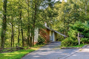 Private tri-level home in a wooded setting.