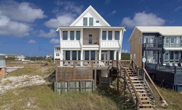 Beach front facing side of our home!  Big windows with beautiful views!