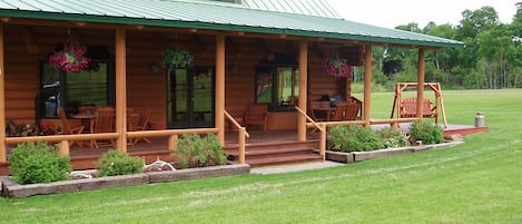 The summer porch at Canyon Ranch Lodge for kicking back and taking in the view