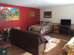 Living room has 2 full size sofas.