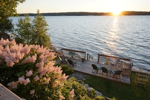 Mid-June, lilacs in bloom, lower deck, sunset.