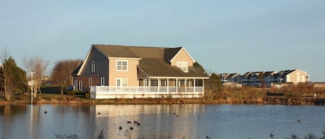 Back of home overlooking serene pond