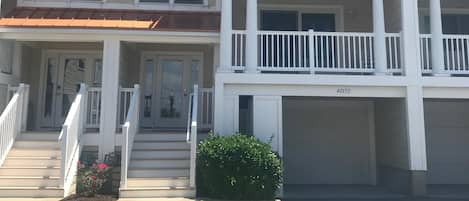 Exterior view - Private balconies on every level and two car garage with storage