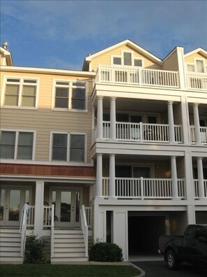 Exterior view - Private balconies on every level and two car garage with storage