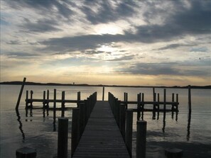 Beautiful bay sunset over the private pier.  Perfect way to end the day