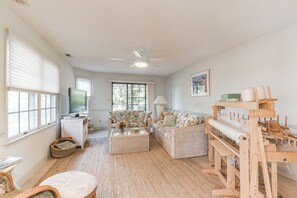 First Floor Den with Pull-Out Queen Couch and Pocket Doors to the Room