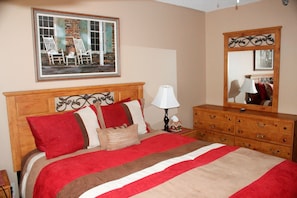 Master bedroom with queen size bed and European pillowtop mattress