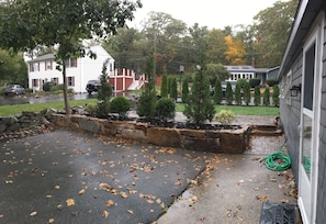 Private patio area shielded from the street