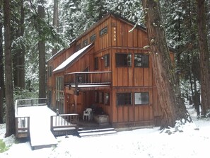 Our cabin in a light snow in May