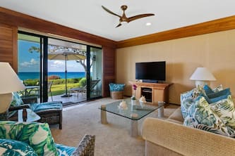 Oceanfront Breezy Corner Condo w/ Air Conditioning by Alekona Kauai
