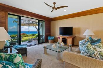 Oceanfront Breezy Corner Condo w/ Air Conditioning by Alekona Kauai