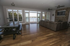 Main Floor Entry Living Room Area and X Large Table for Dining.