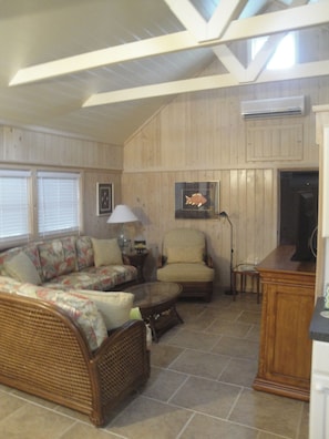 Living room, entertainment center to right