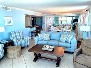 Relax in the comfortable living room with both Gulf front and Bayside views.