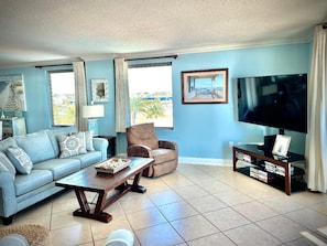 Relax in the comfortable living room with both Gulf front and Bayside views.