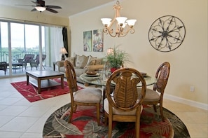 Bright and Light Living! Porcelain tile floors and crown molding!
