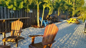 Relaxing grilling area with a sunset view.