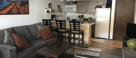 Nice open floor plan. New microwave, fridge, newly redone cabinets, new flooring