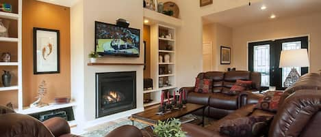 Great room with gas fireplace, 60 in Smart TV, Direct TV, Bluray & Roku