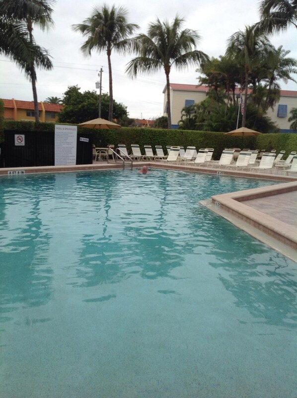 Pool & hot tub area . Also has grills for cooking !