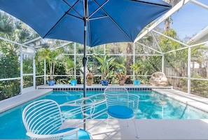 Enjoy the tropical pool oasis & waterfall.