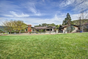 Across Lawn Facing Bocce Ball Court and Grape Arbor