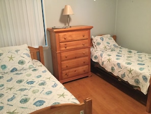 2 twin beds in the 2nd bedroom. Linens not included.
