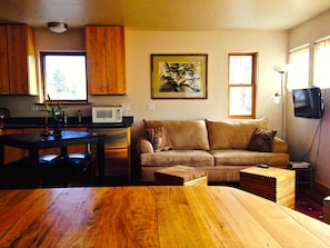 Living area view as you come up the stairs. Beautiful wood everywhere!