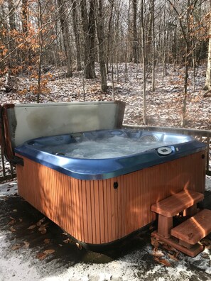 Large Hot Tub for 6-8 people with wooded views. Perfect for relaxing!